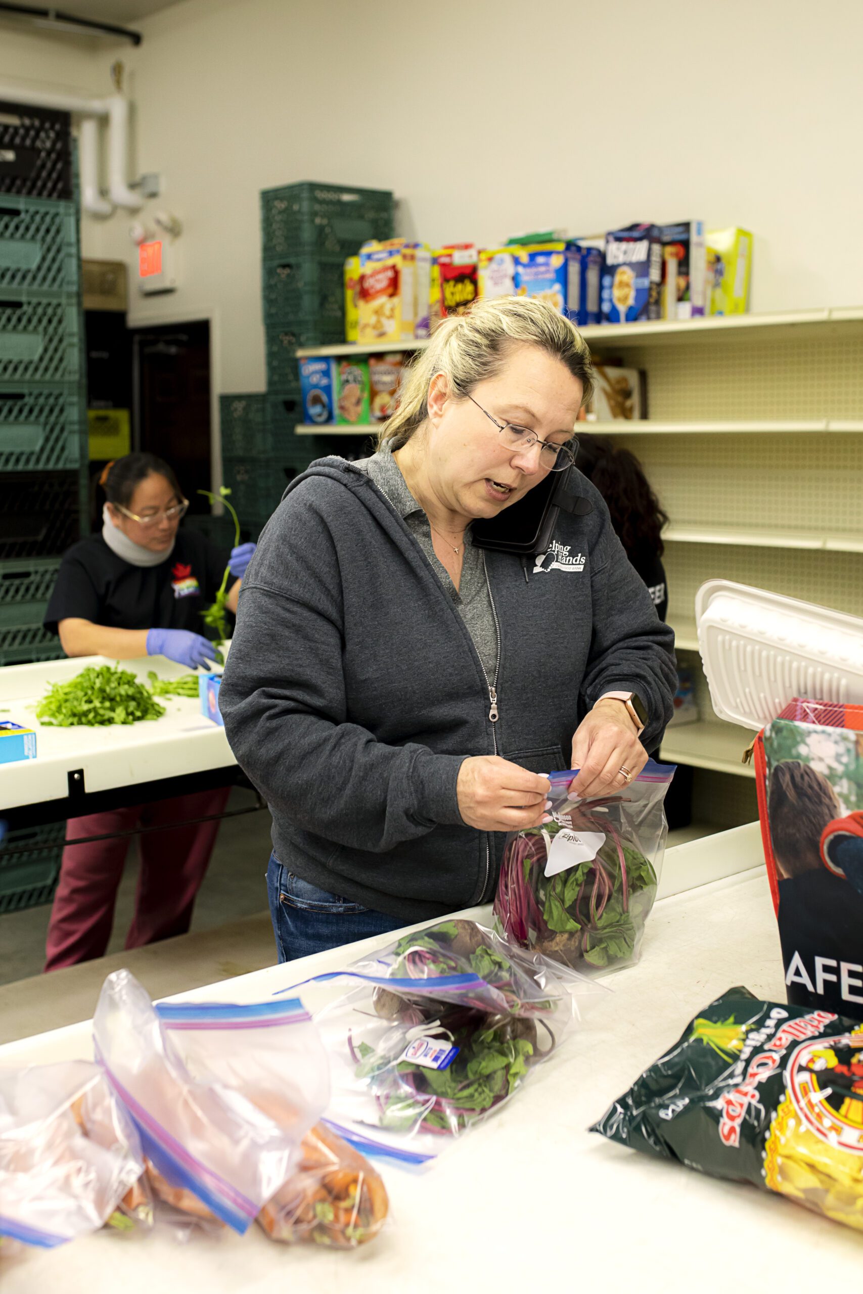 June7,20238654 Group of unrecognizable volunteers working in community charity donation center, food bank and coronavirus concept.